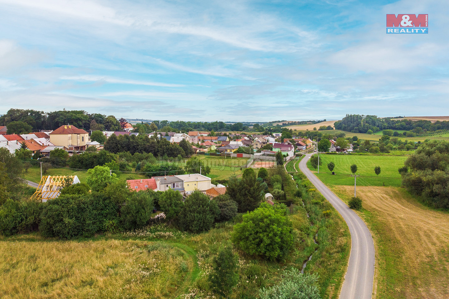 Prodej stavebního pozemku 936 m² – pohled 6
