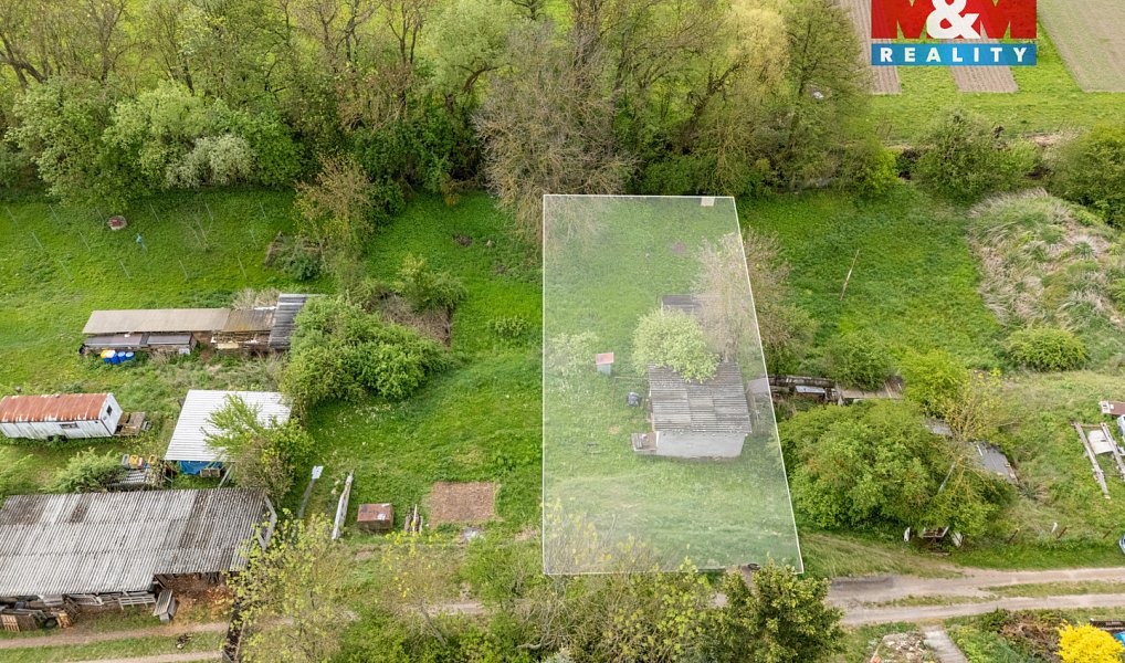 Prodej stavebního pozemku 709 m², Slaný – náhled fotky 2