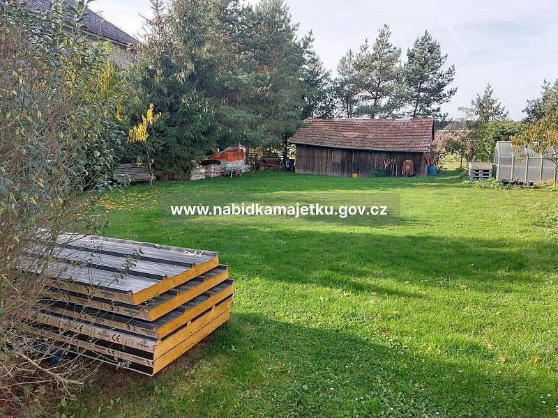 Prodej pozemku 701 m² — photo 2