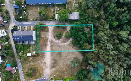 Prodej stavebního pozemku 1 605 m², Husinec, okres Praha-východ