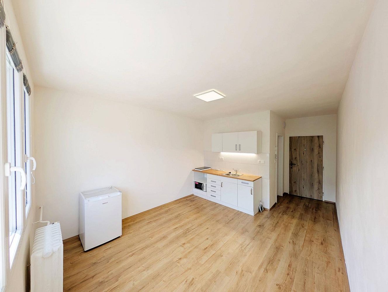 Pronájem bytu 1+kk 19 m² — photo 2