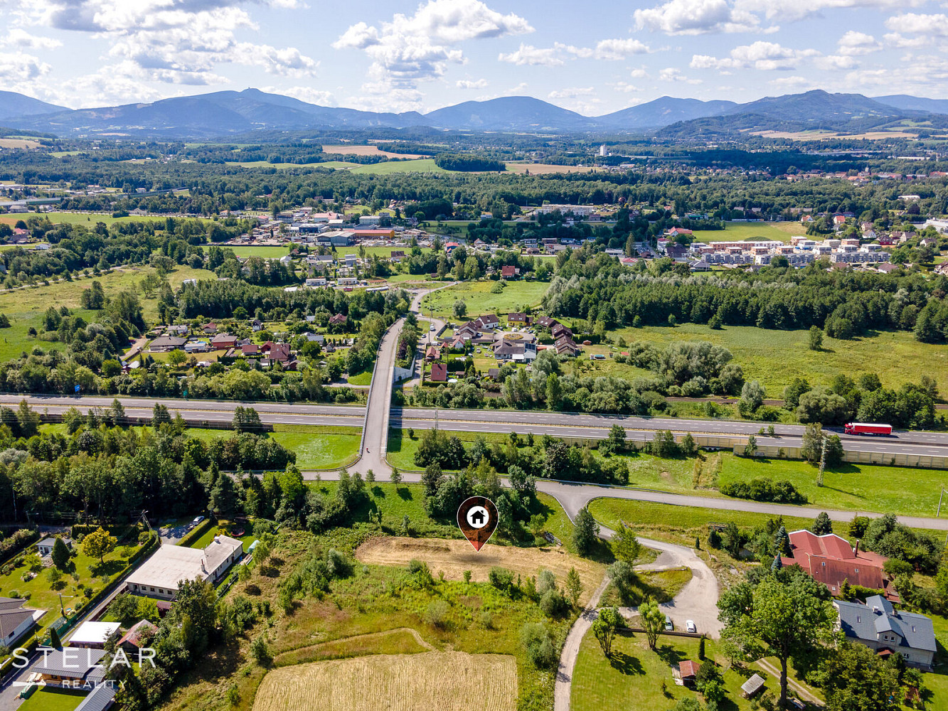 Prodej stavebního pozemku 1 700 m² – fotografie 2