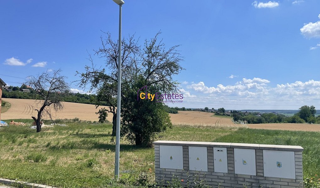 Prodej stavebního pozemku 1 090 m², Dobrovice – náhled fotky 3