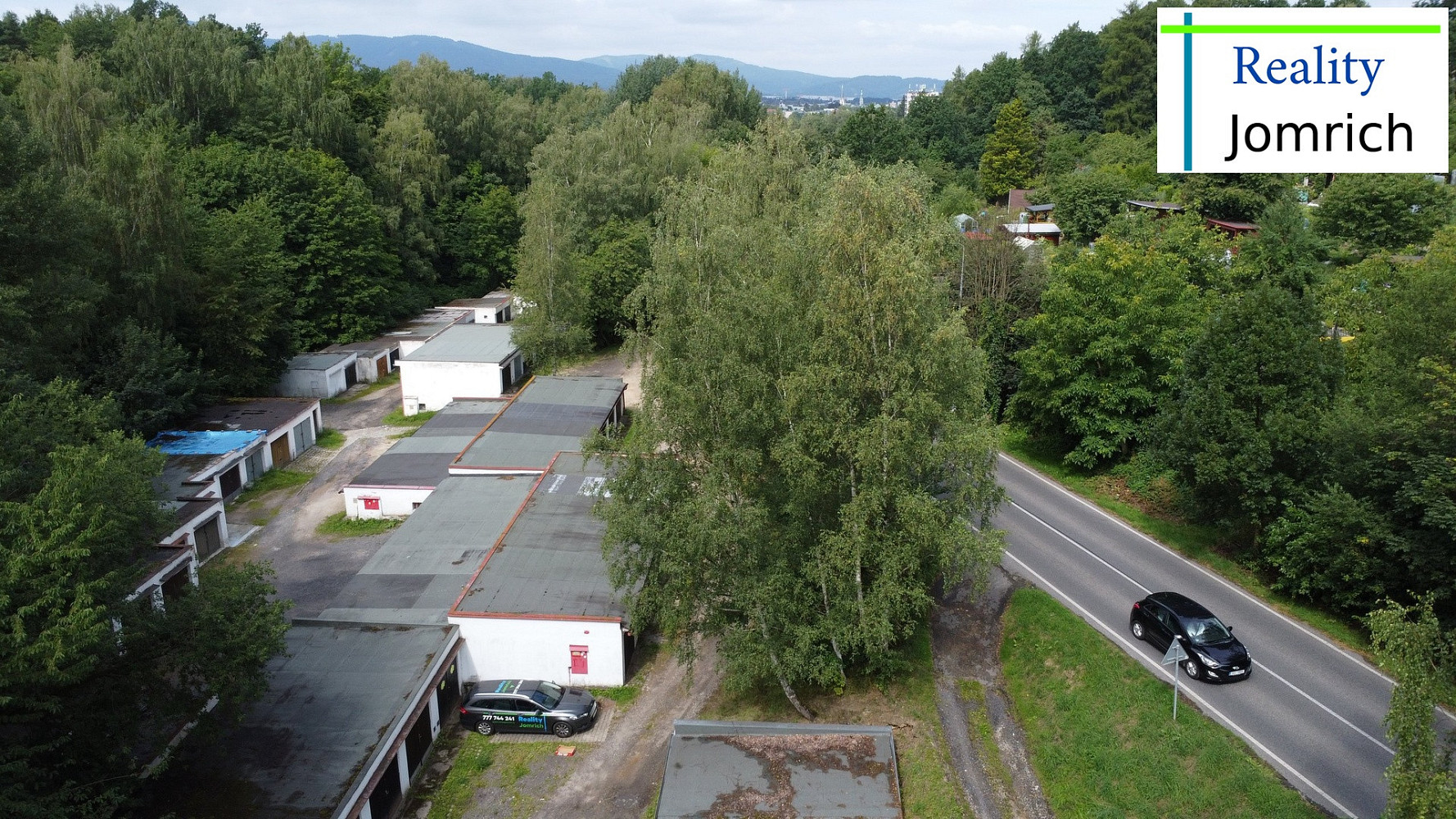 Prodej zděné garáže s elektřinou a masivní mříží v liberci, ulice kunratická. — photo 3