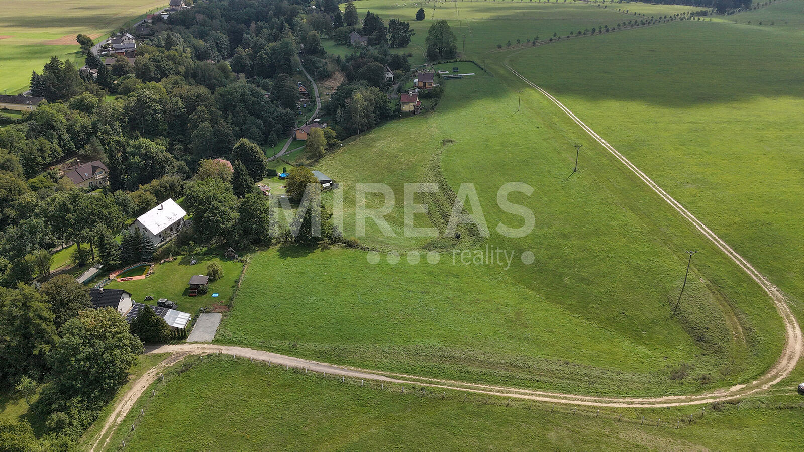 Prodej stavebního pozemku 2 516 m² – fotografie 4