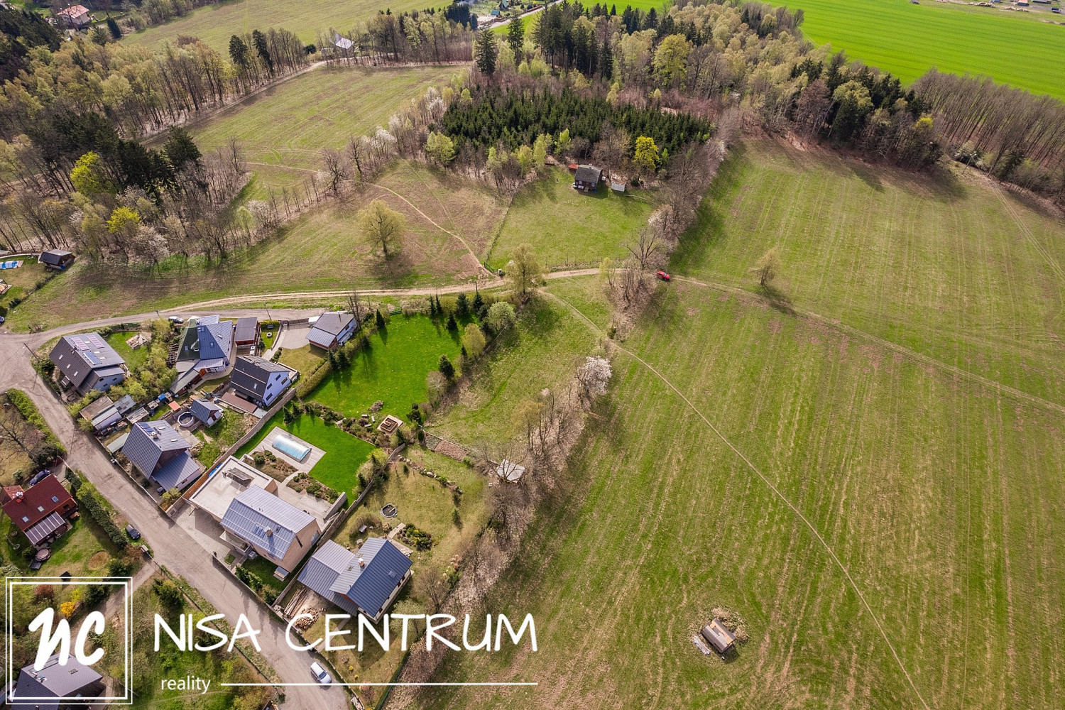Prodej stavebního pozemku 2 075 m² – pohled 4