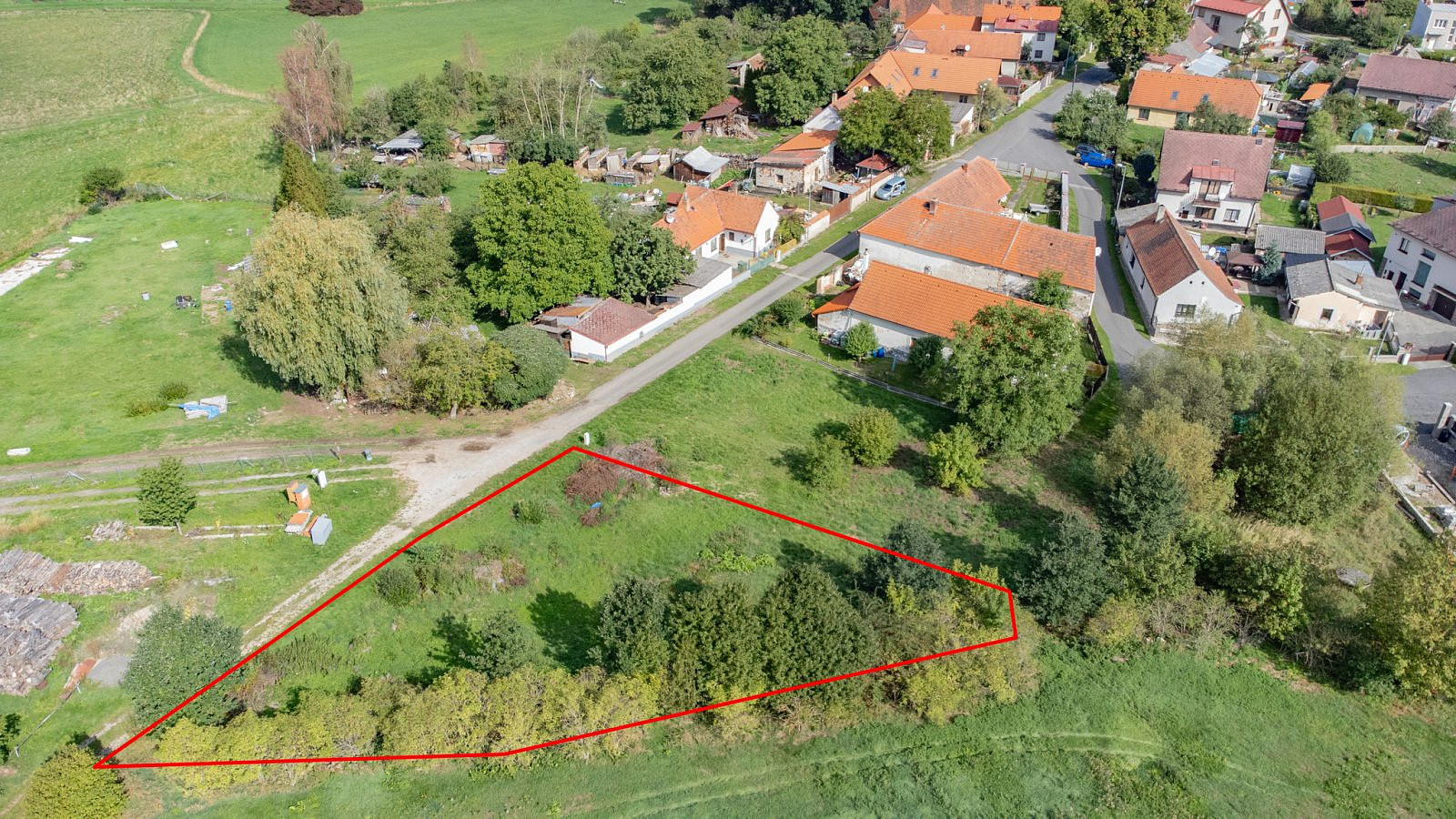 Prodej stavebního pozemku 992 m² – fotografie 3