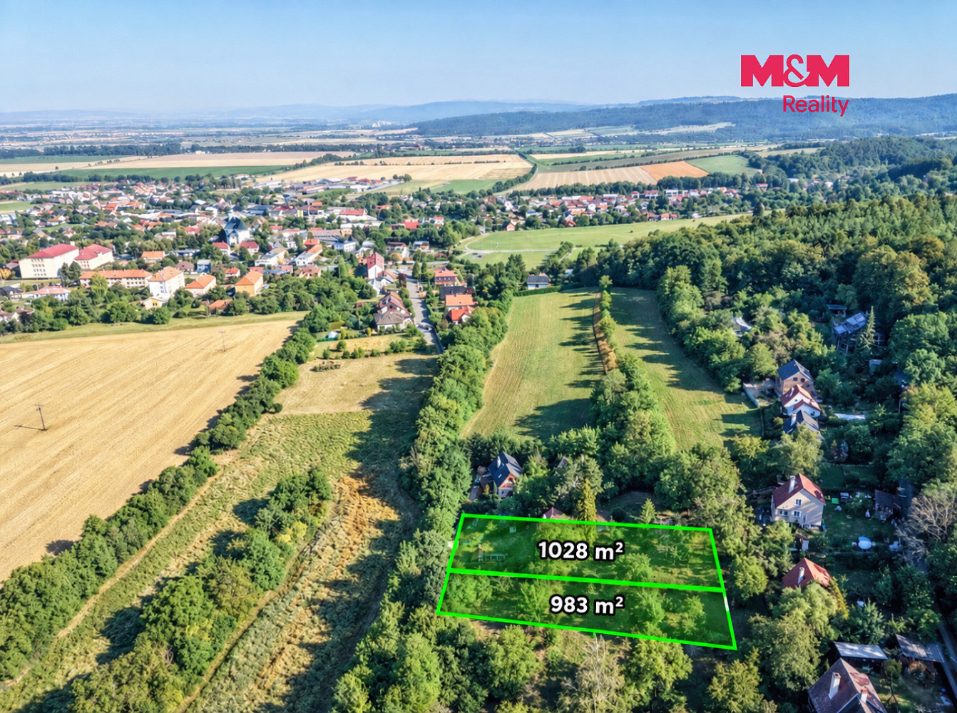 Prodej stavebního pozemku 983 m² – fotografie 2