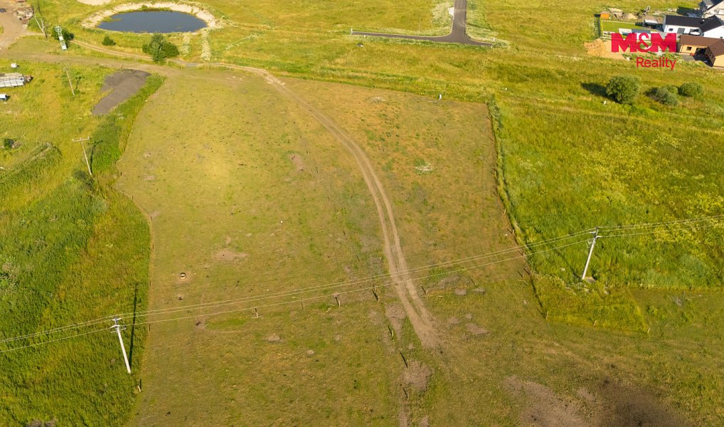 Prodej stavebního pozemku 1 100 m², Kolová – náhled fotky 6