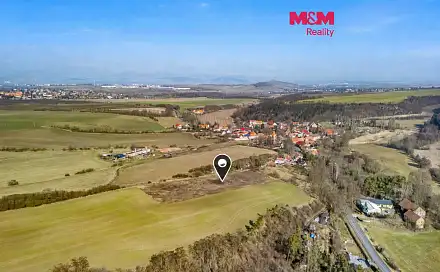 Prodej stavebního pozemku 1 068 m², Louny - Brloh