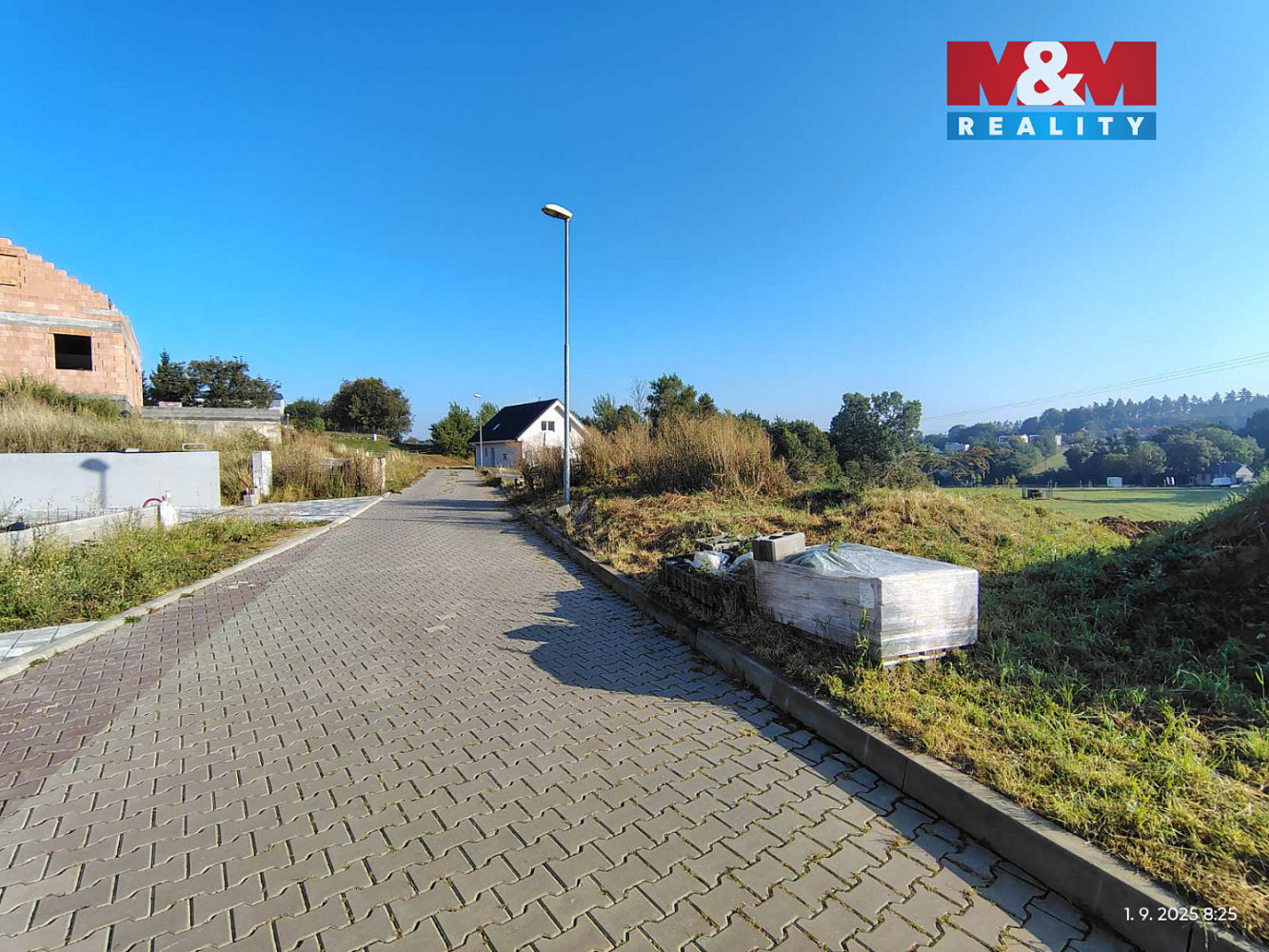 Prodej stavebního pozemku 827 m² — photo 2