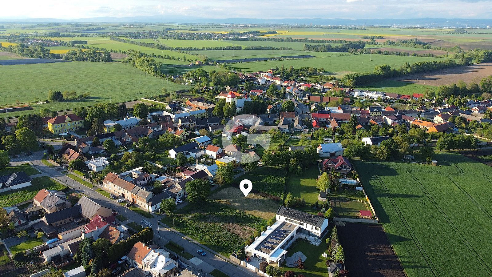 Prodej stavebního pozemku 936 m² – pohled 3