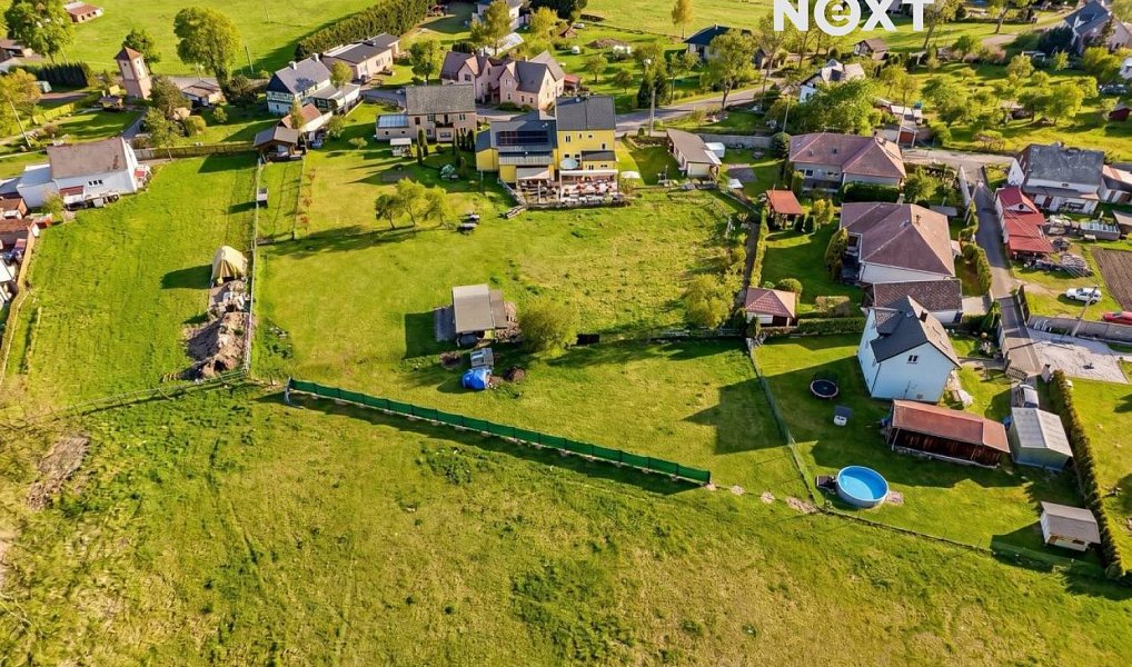 Prodej stavebního pozemku 2 246 m², Pila – náhled fotky 7