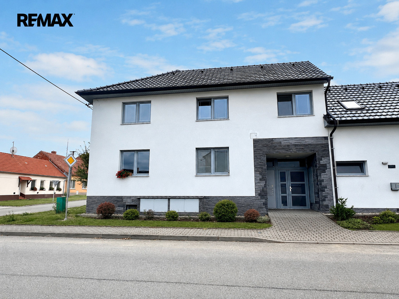 Prodej nájemního domu, činžáku 262 m²
