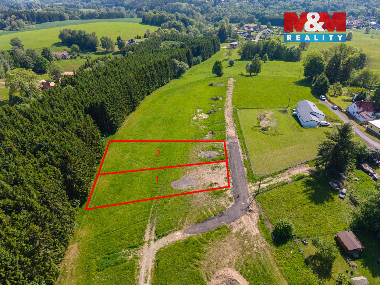 Prodej stavebního pozemku 1 000 m² – fotografie 2