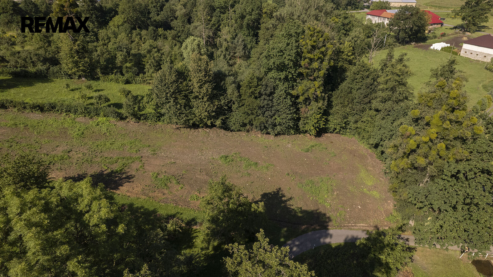 Prodej stavebního pozemku 3 003 m² – fotografie 4
