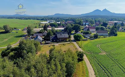 Prodej stavebního pozemku 1 442 m², Okna, okres Česká Lípa