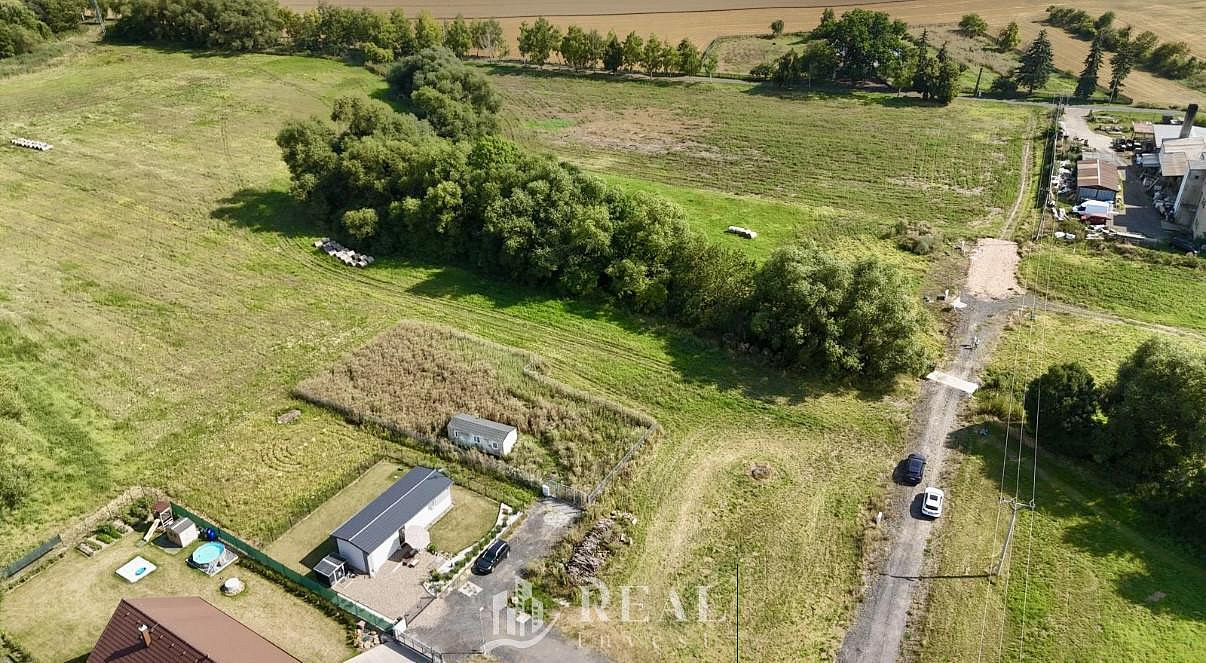 Prodej stavebního pozemku 1 213 m² — photo 3