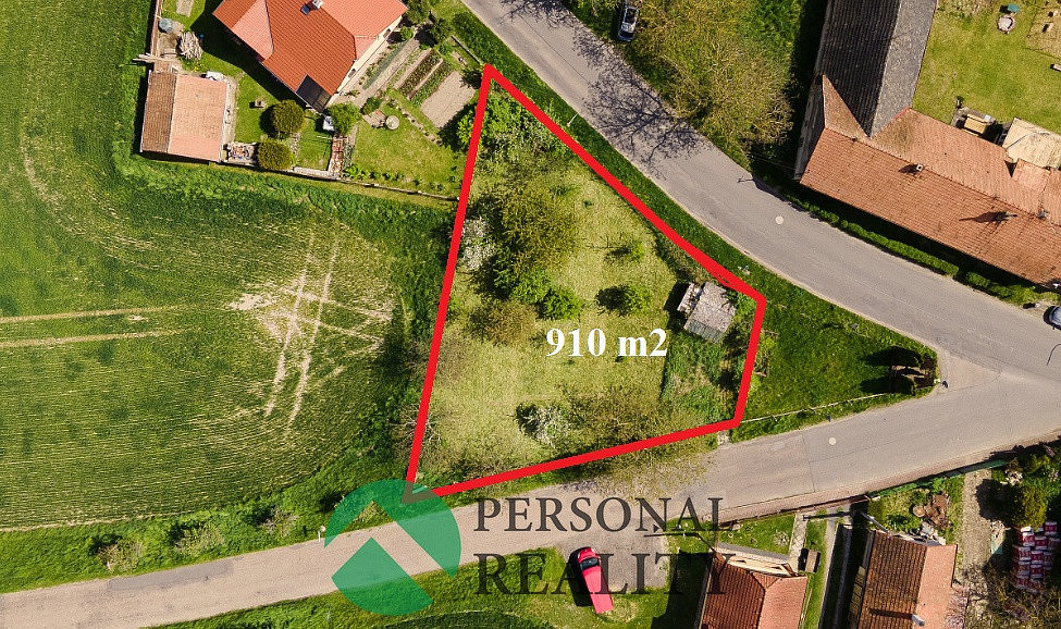 Prodej stavebního pozemku 910 m² – pohled 2