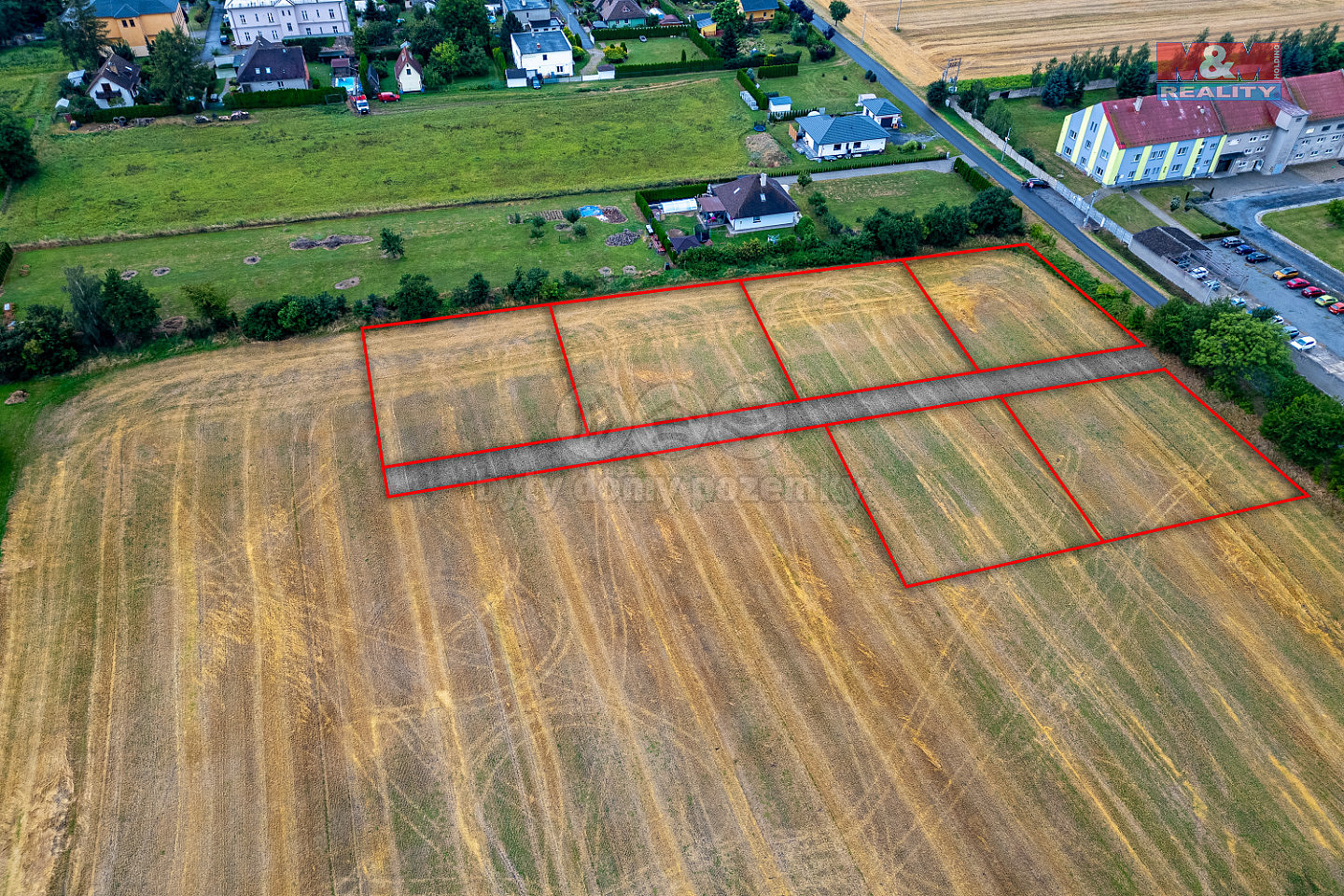 Prodej stavebního pozemku 6 975 m² – pohled 2