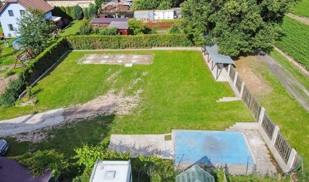 Prodej stavebního pozemku 1 209 m², Plužná – náhled fotky 4