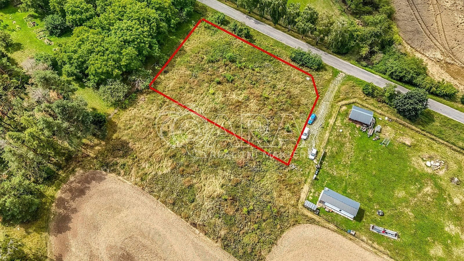 Prodej stavebního pozemku 1 760 m² – pohled 2