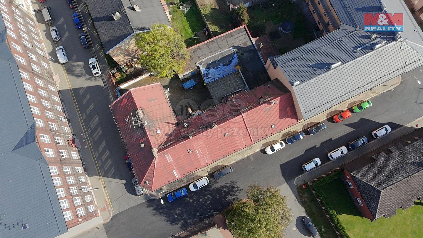 Prodej nájemního domu, činžáku 600 m² — photo 4