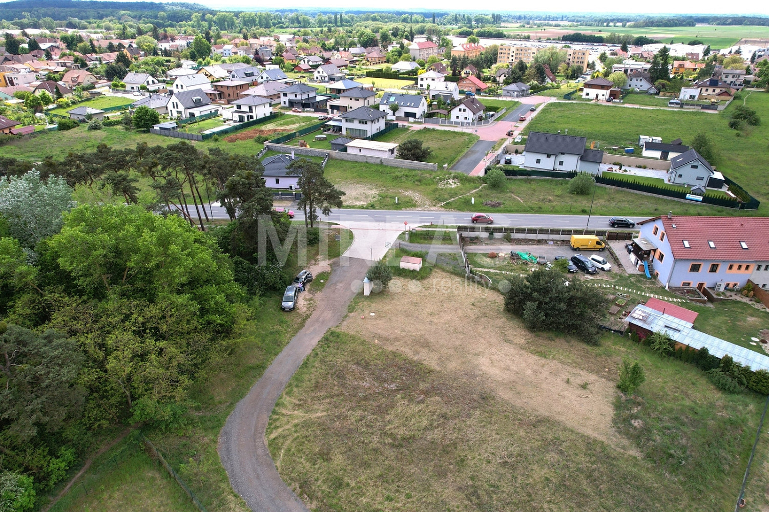 Prodej stavebního pozemku 932 m² – fotografie 2