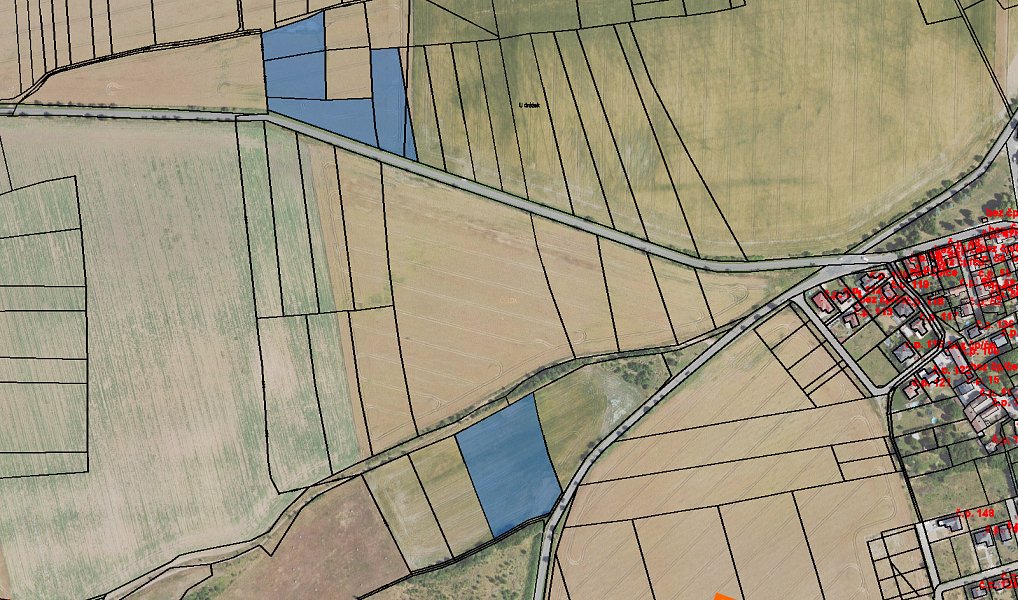 Prodej pole 5 527 m², Dobříč – fotka 1 z 3