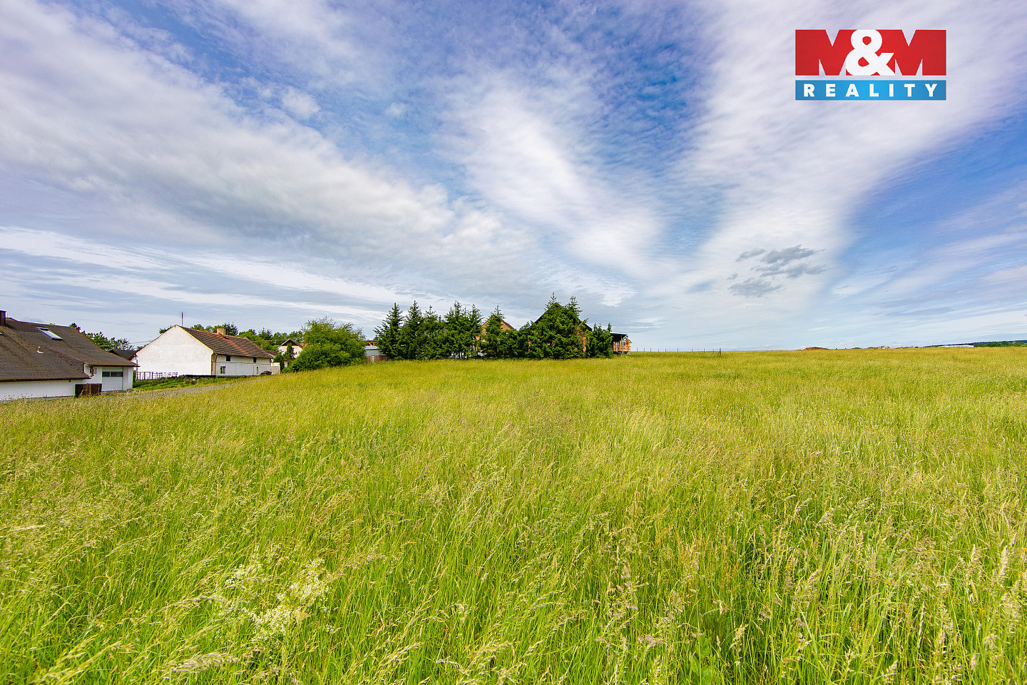 Prodej stavebního pozemku 907 m² – pohled 2