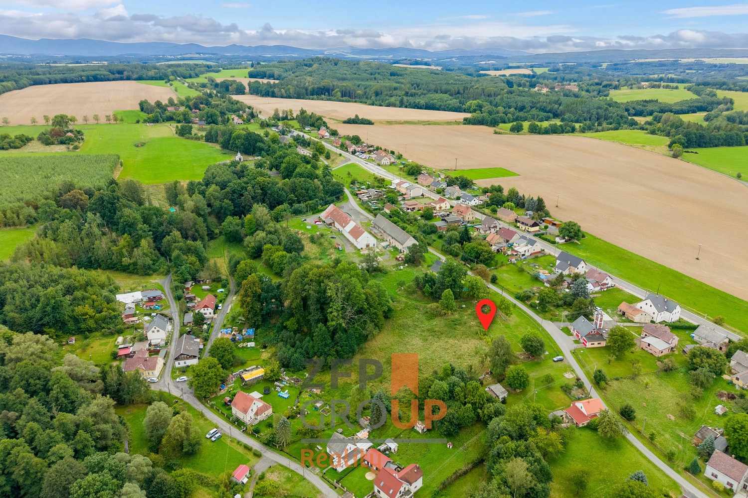 Prodej stavebního pozemku 4 693 m² – fotografie 5