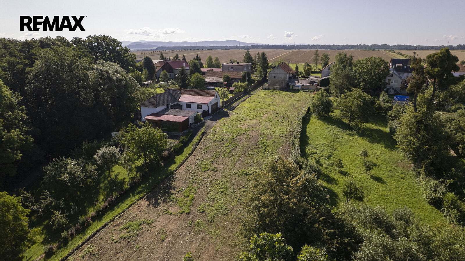 Prodej stavebního pozemku 3 003 m² – fotografie 5