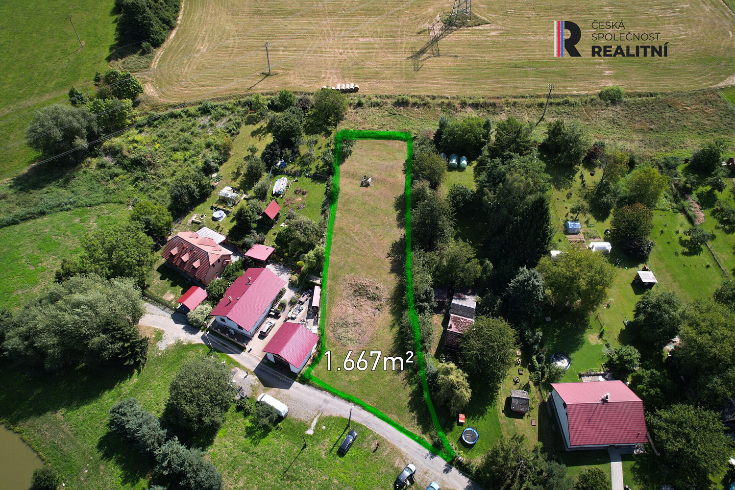 Prodej stavebního pozemku 1 667 m² – pohled 4