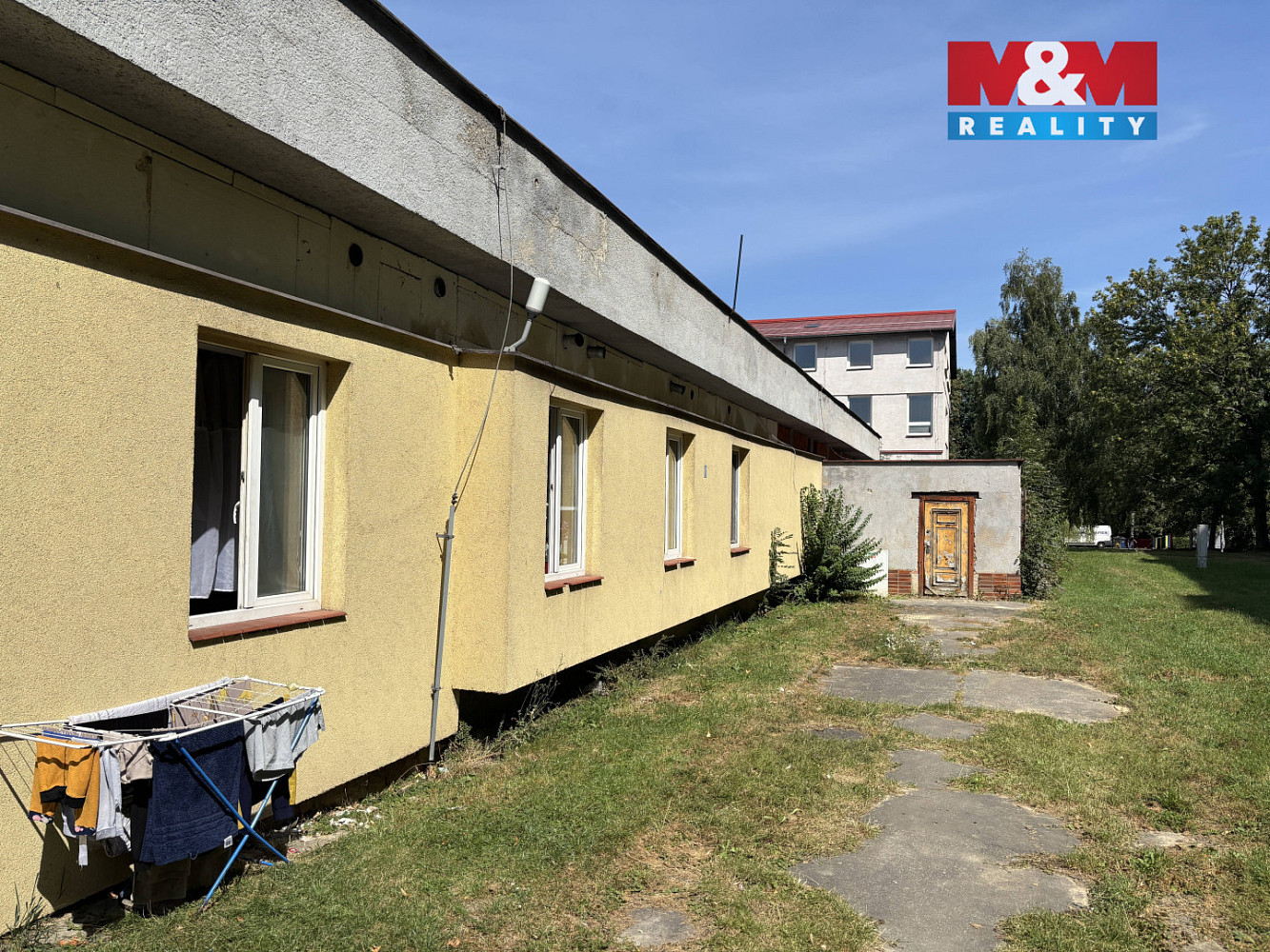 Prodej nájemního domu, činžáku 618 m² — photo 2