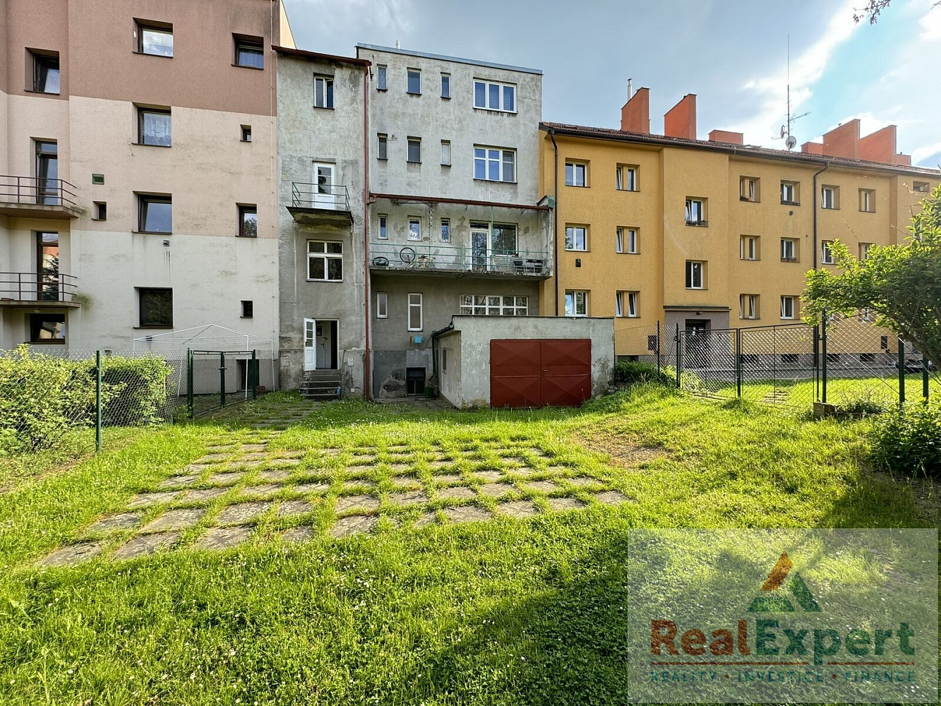 Prodej nájemního domu, činžáku 430 m² — photo 2