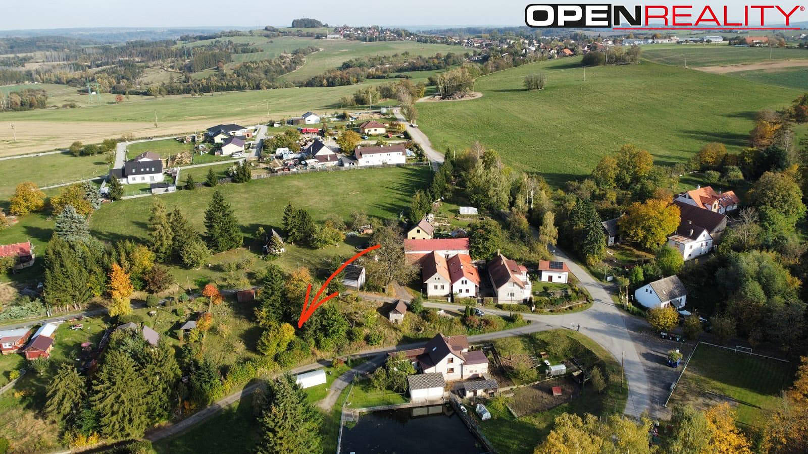 Prodej stavebního pozemku 976 m² – pohled 2