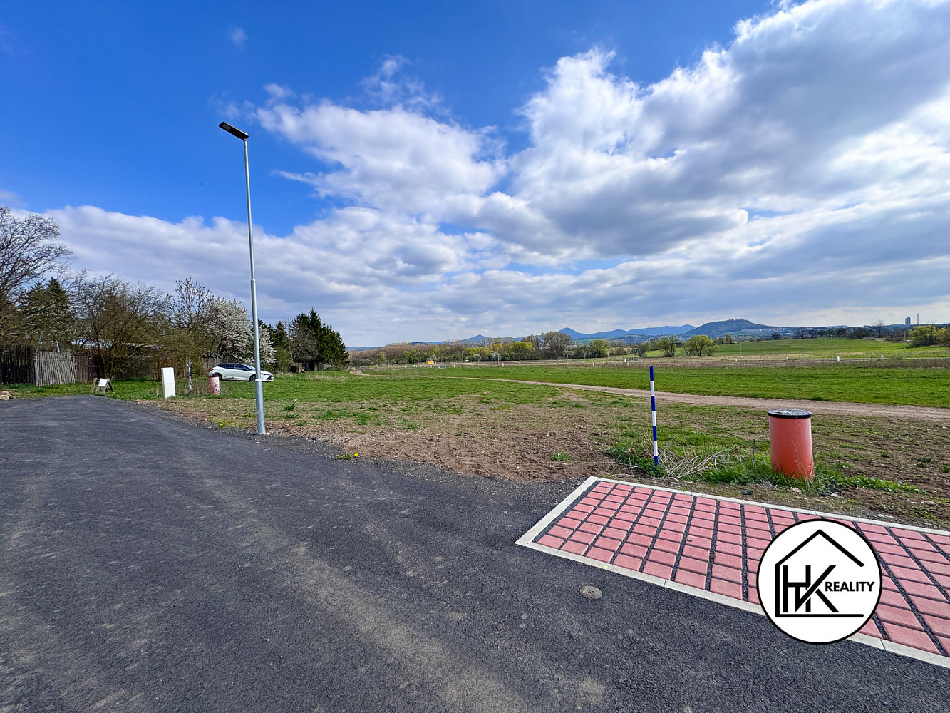 Prodej stavebního pozemku 843 m² – pohled 4