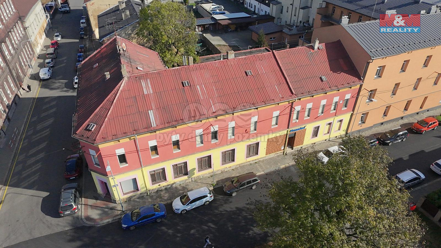 Prodej nájemního domu, činžáku 600 m² — photo 3