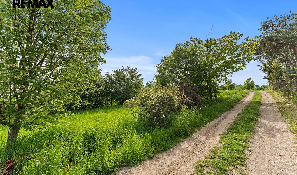 Prodej stavebního pozemku 950 m², Mořina – náhled fotky 13