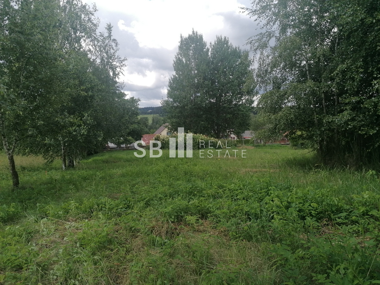Prodej stavebního pozemku 1 405 m² – pohled 2