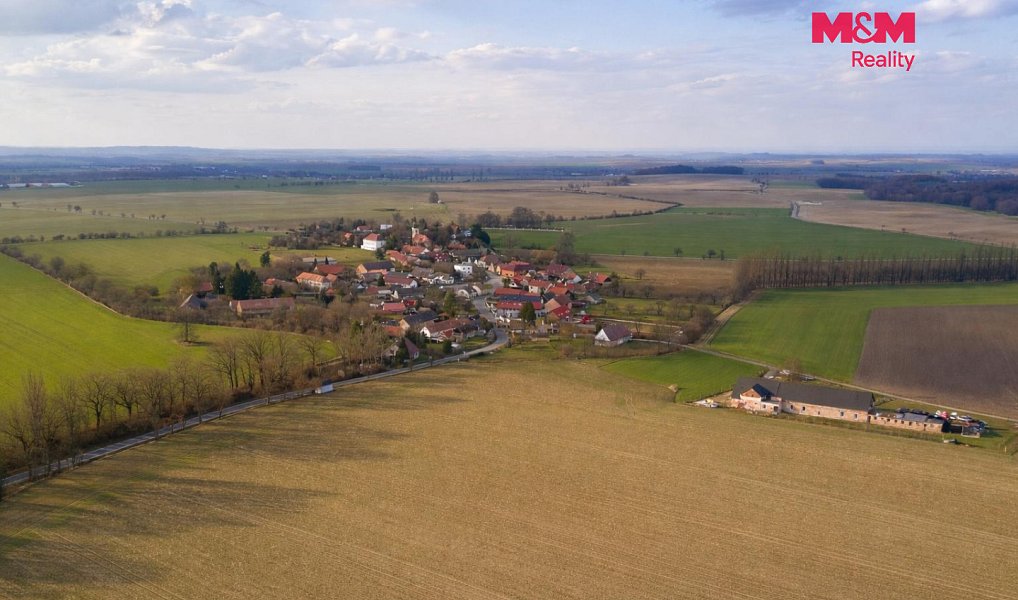 Prodej stavebního pozemku 2 006 m², Suchdol – náhled fotky 4