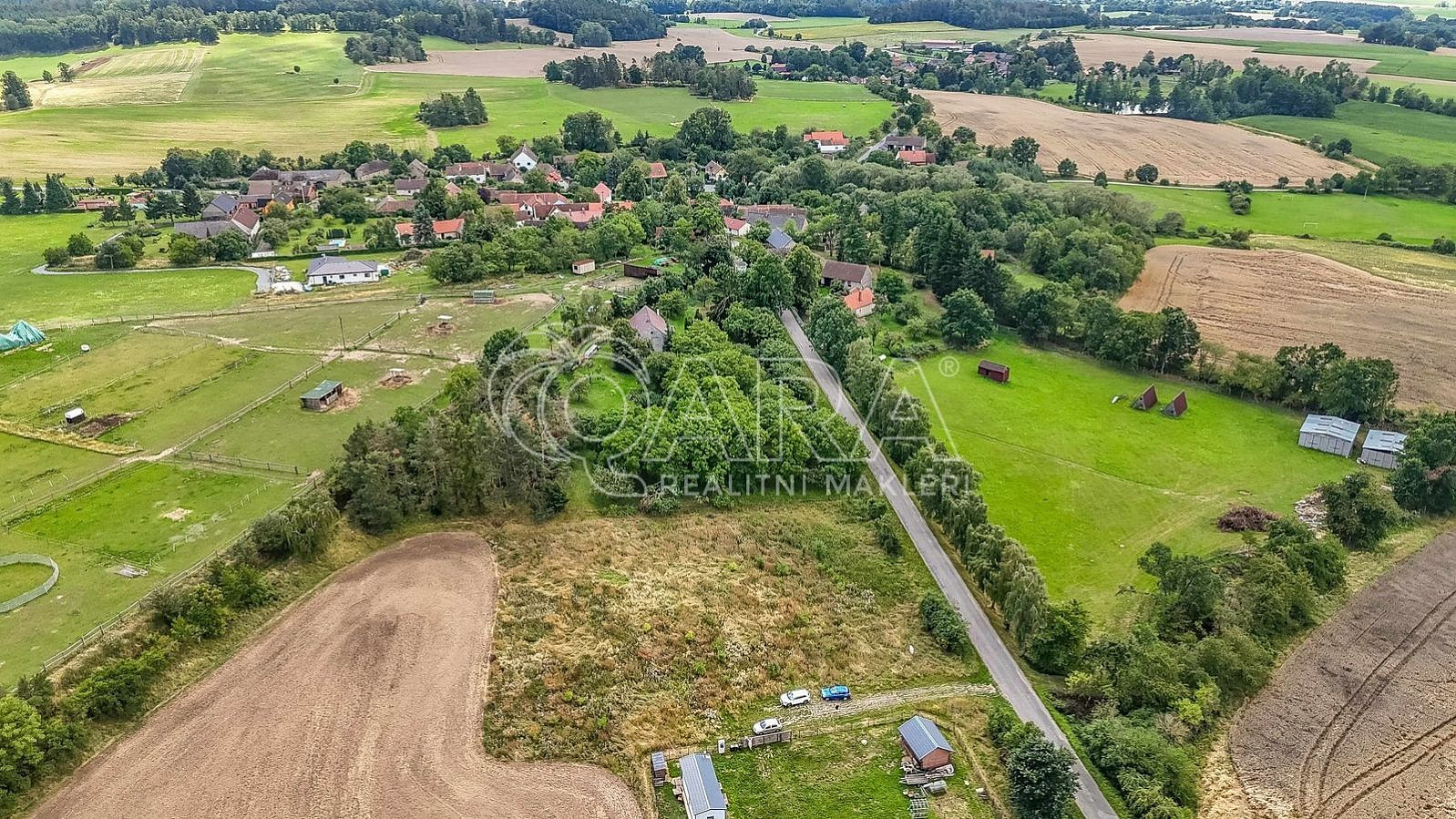 Prodej stavebního pozemku 1 760 m² – pohled 4