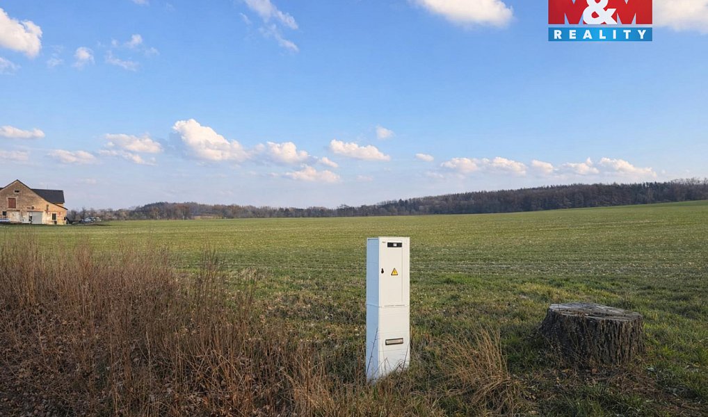 Prodej stavebního pozemku 2 006 m², Suchdol – náhled fotky 3