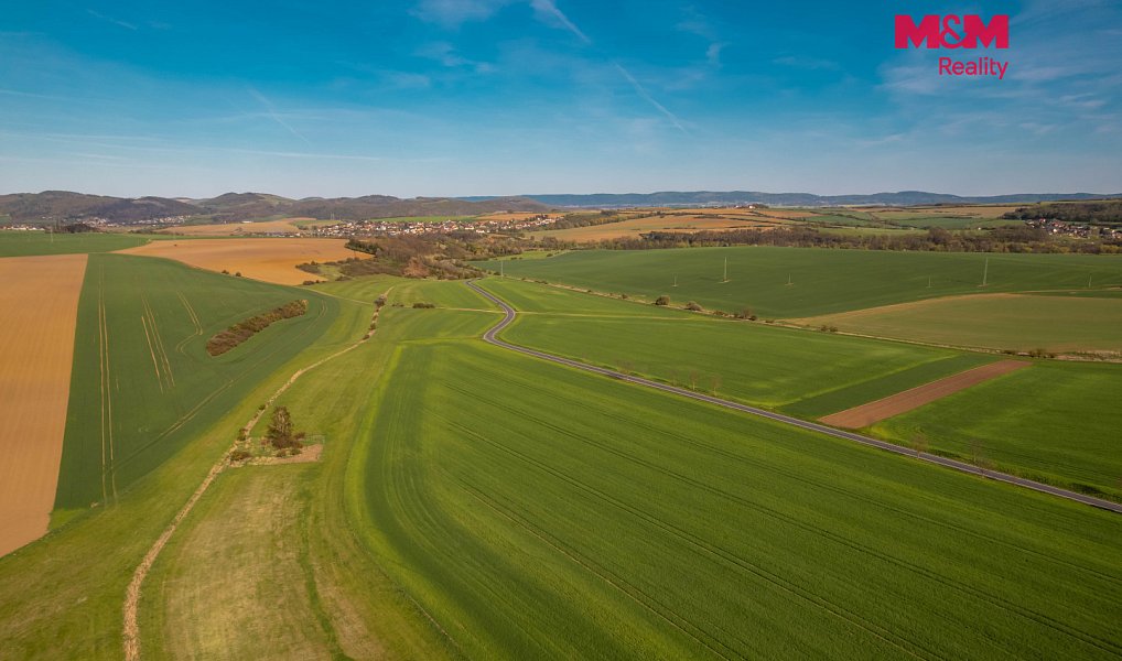 Prodej stavebního pozemku 1 000 m², Chlustina – náhled fotky 11