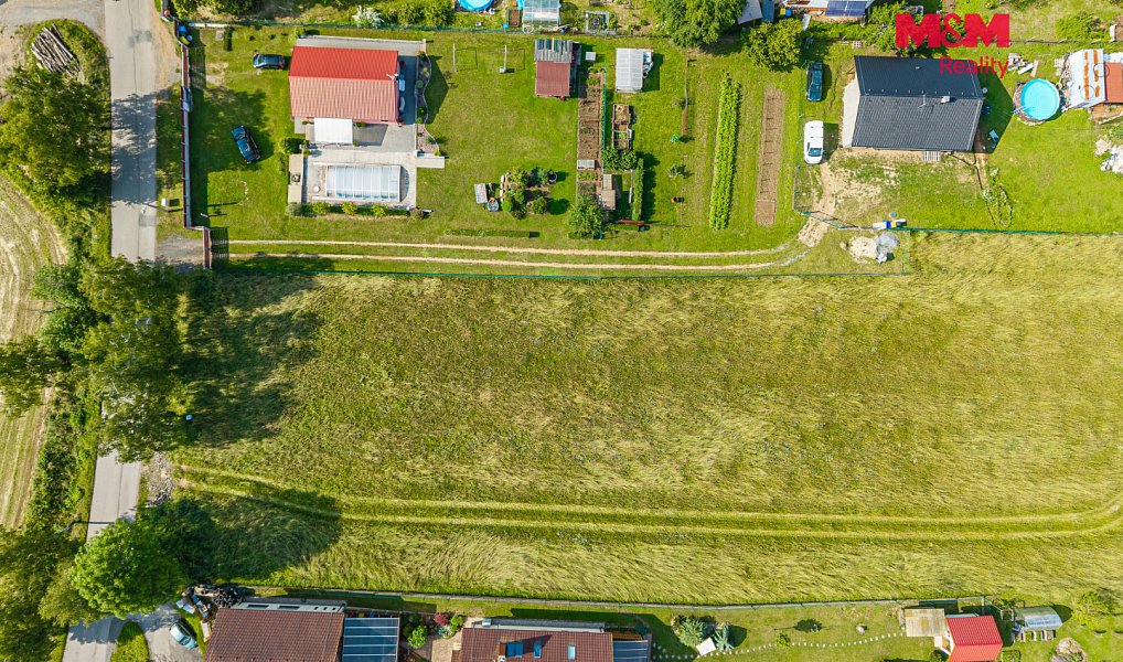 Prodej stavebního pozemku 1 100 m², Hrusice – náhled fotky 2