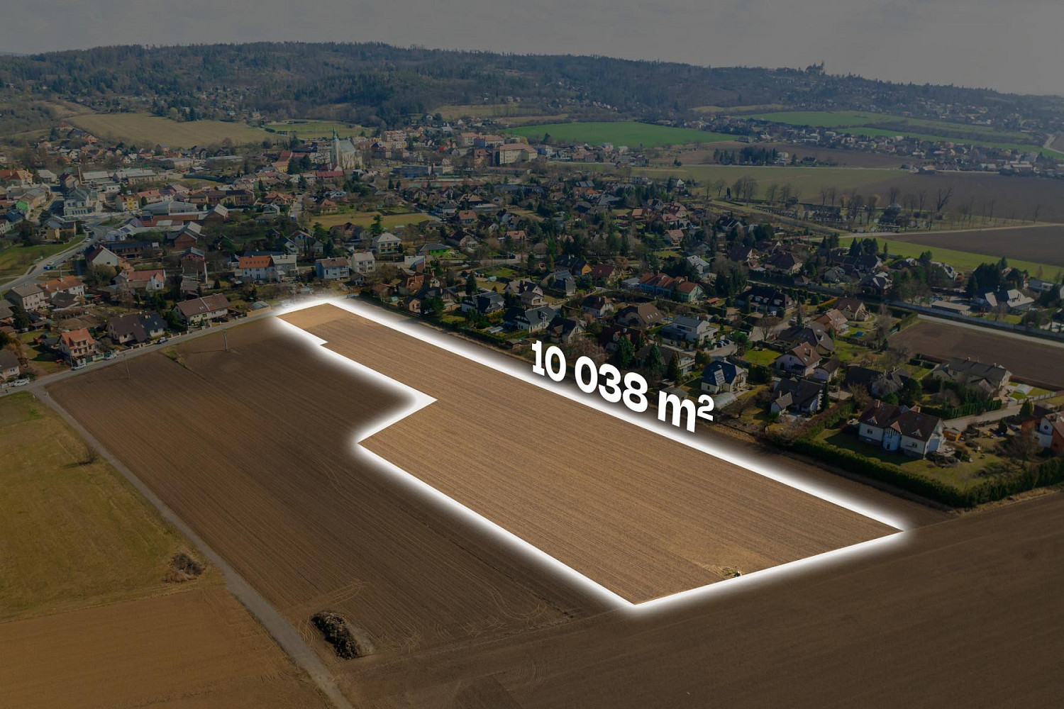 Prodej stavebního pozemku 10 038 m²
