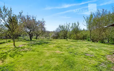 Prodej stavebního pozemku 1 210 m², Kamenný Přívoz - Hostěradice, okres Praha-západ