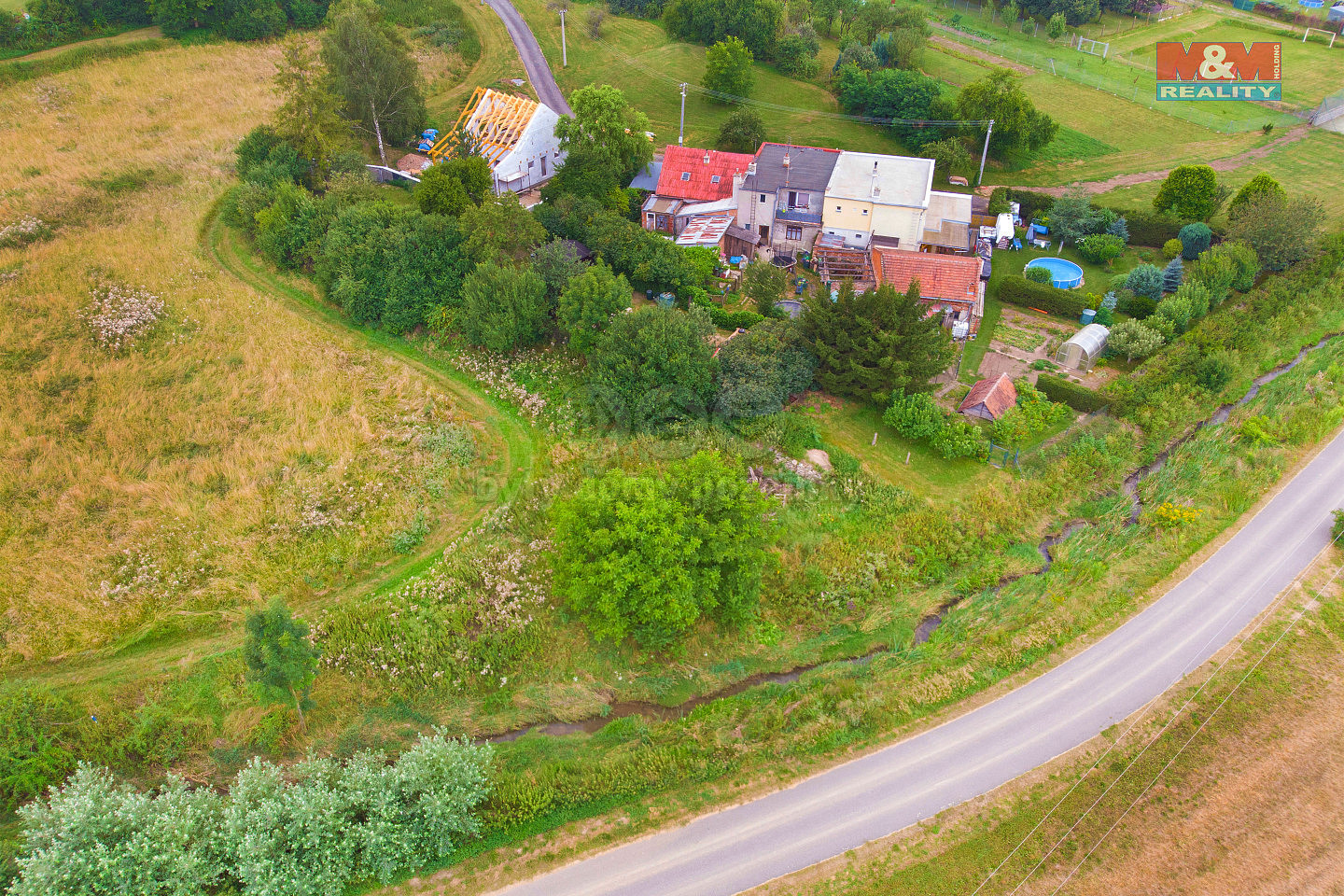Prodej stavebního pozemku 936 m² – pohled 3