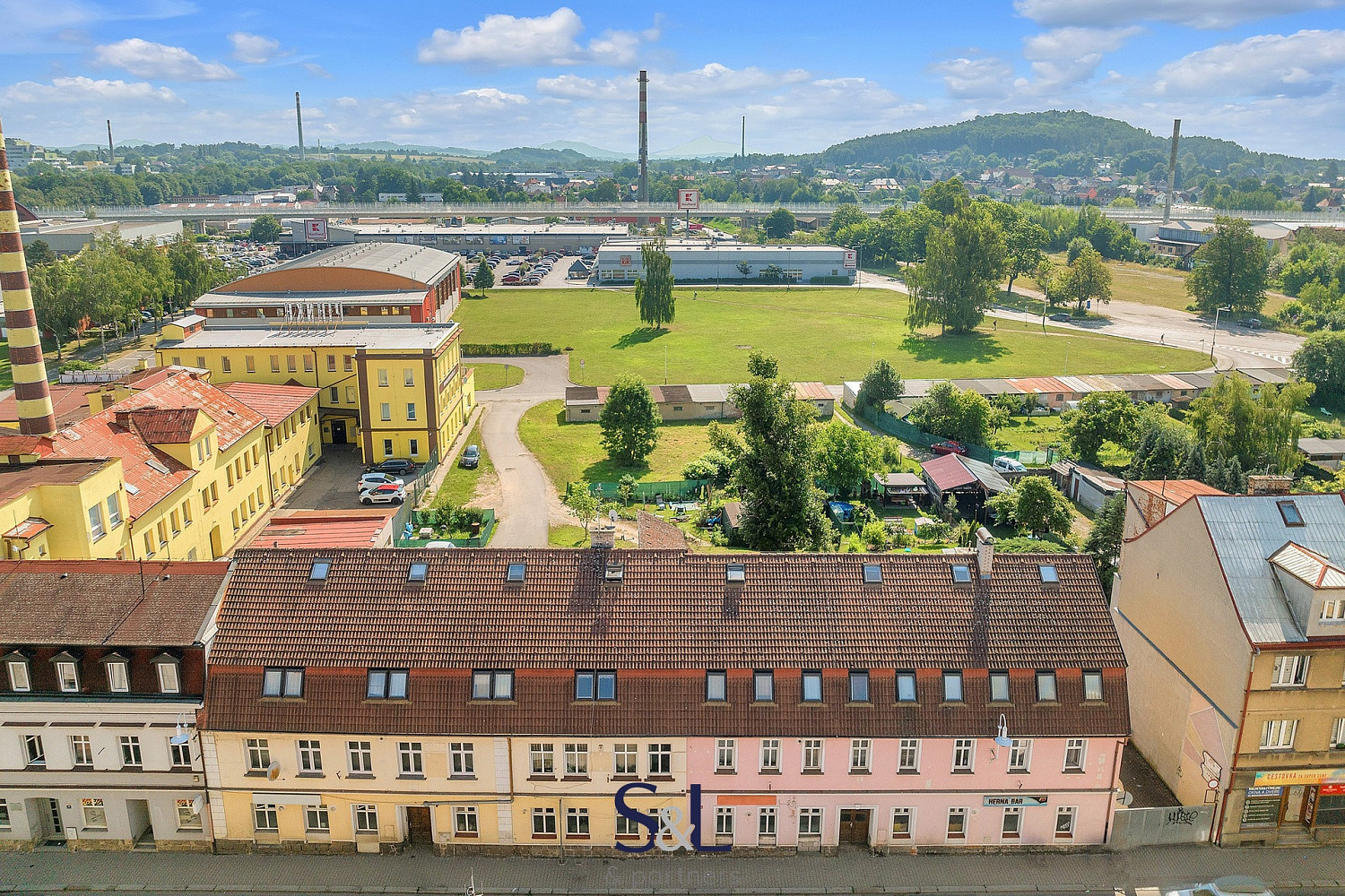 Prodej nájemního domu, činžáku 1 036 m²