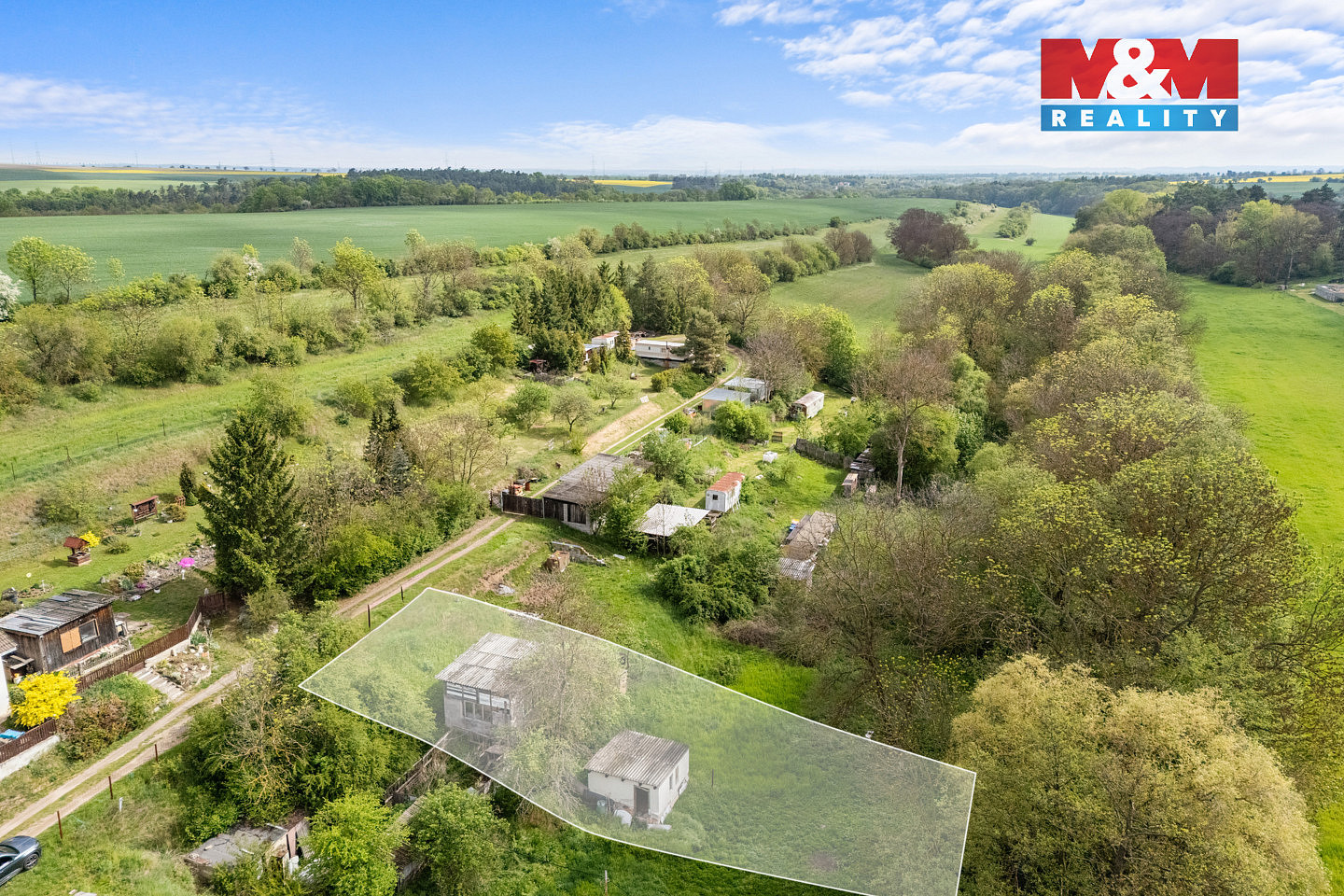Prodej stavebního pozemku 709 m² – fotografie 3